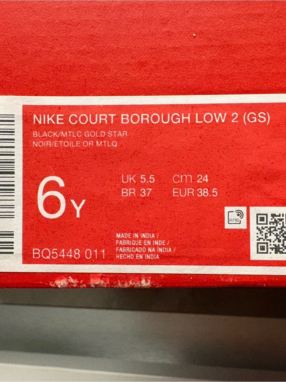Nike Kids Black Sneakers with Gold Swoosh Accent - Picture 5 of 5